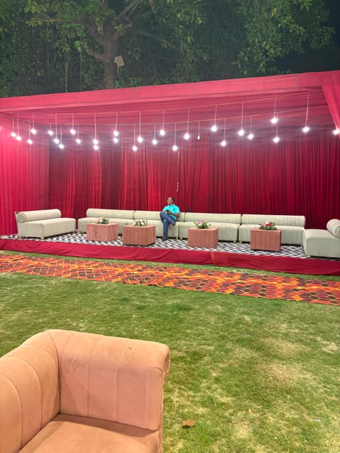 Lounge seating set up on the lawn for an evening celebration